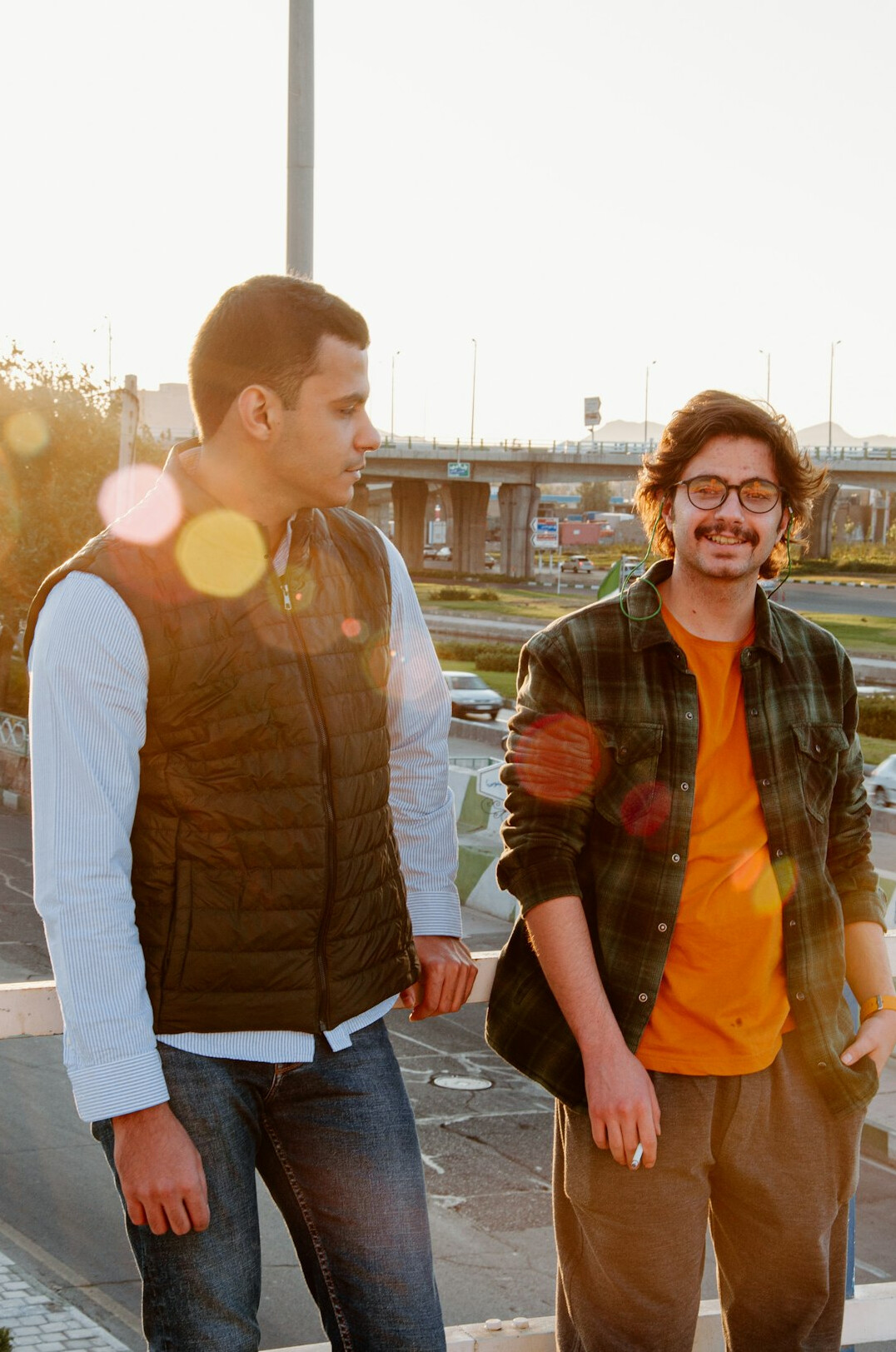 Two people having a friendly conversation outdoors