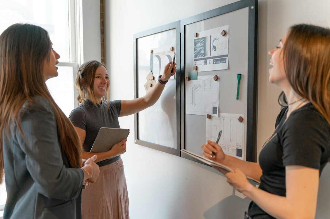 person presenting ideas to team