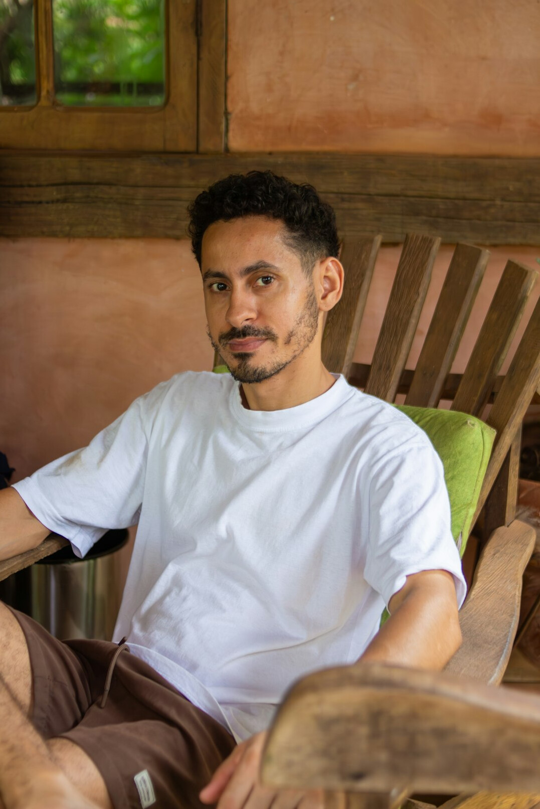 Portrait of a smiling Brazilian man with a beard