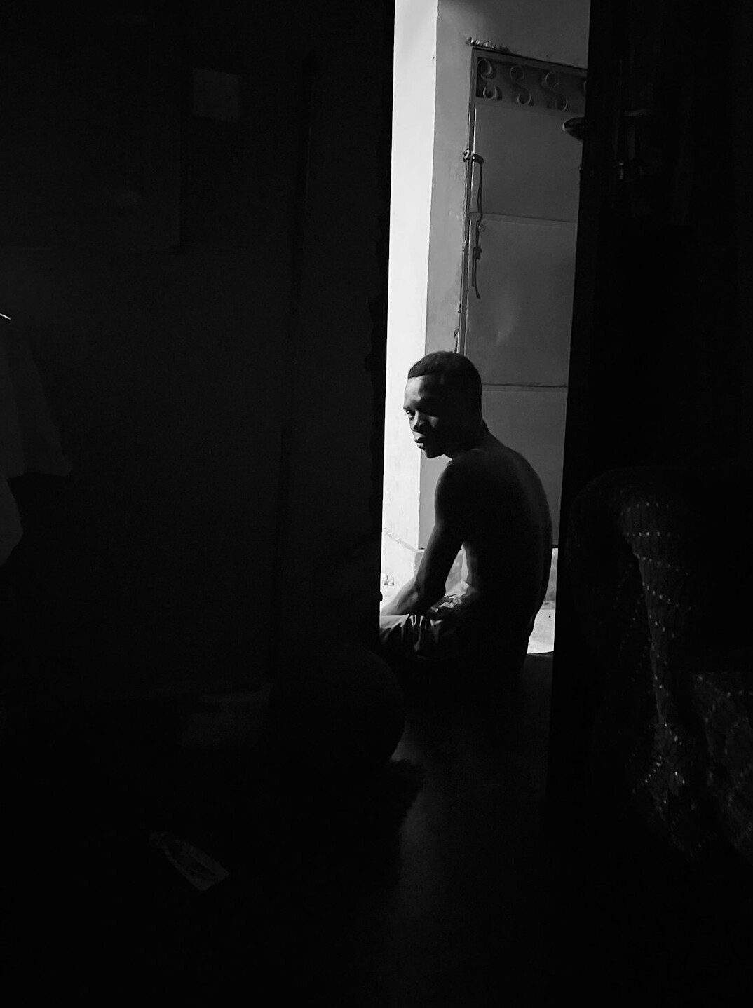 person reflecting alone in quiet room
